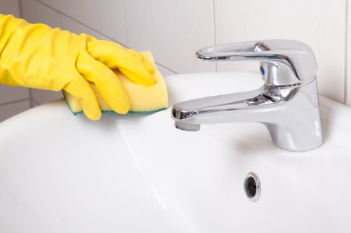 Local cleaners working in a Highbury apartment with access challenges